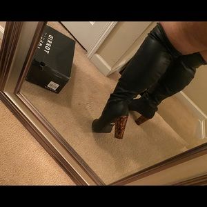 Leather over the knee high boots. Funky heel!